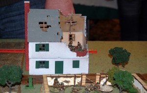 Rifle Grenadiers in the Farmhouse with the 2nd Squad taking positions in the walled orchard.